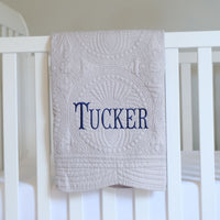 Full Name Monogrammed Gray Baby Quilt with navy full name letters